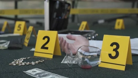 Crime scene of failed robbery of wealthy apartment. Evidence tags, victim's hand Stock Footage 286751765