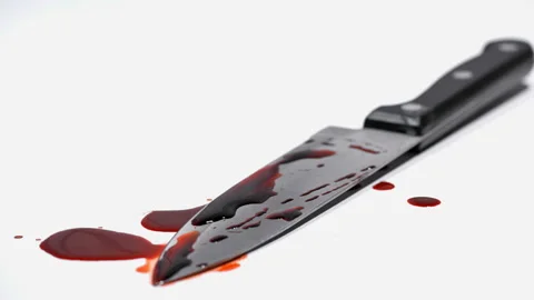 At the crime scene, a forensic expert puts a photo marker on the crime gun. Stock Footage 103236505