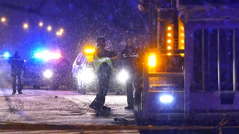 Crime scene with inspector at night Stock-Footage 101995453