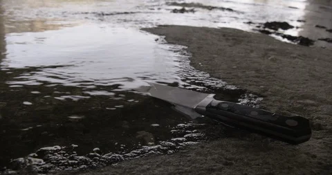 Crime Scene LA River Kitchen Knife in Water Stock Footage 90876648