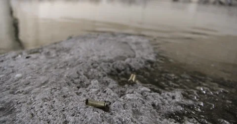 Crime Scene LA River Water Bullet Shell 01 Stock Footage 90876560