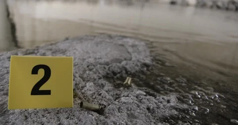 Crime Scene LA River Water Bullet Shells Evidence Marker 02 Stock Footage 90876587