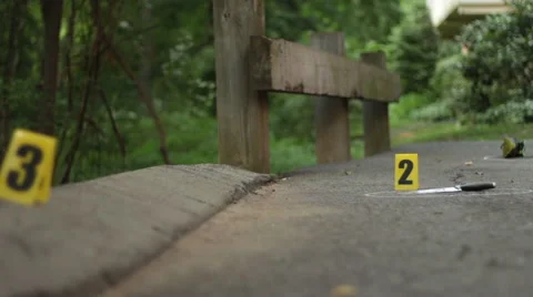 Crime Scene Markers on Ground Stock Footage 53200727