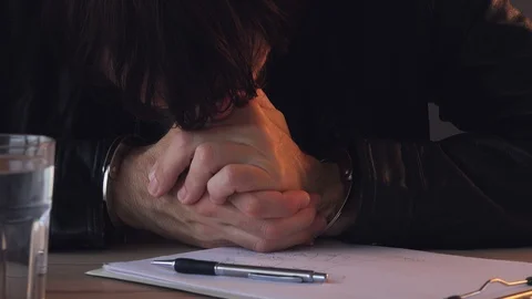 Crime suspect during interrogation Stock Footage 99355126