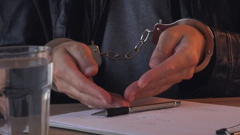 Crime suspect during interrogation Stock Footage 99355921