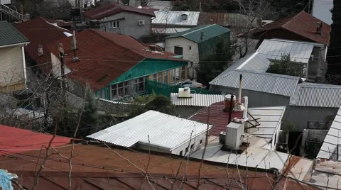 CRIMEA. APRIL 2011: Roofs of the old houses Stock Footage 49628443