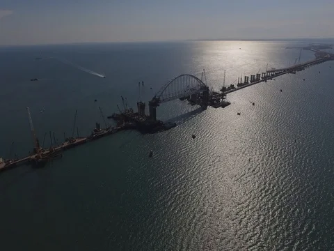 Crimean Bridge in focus while flying to, impressive sunny landscape, 4K D-LOG 動画素材 81141372
