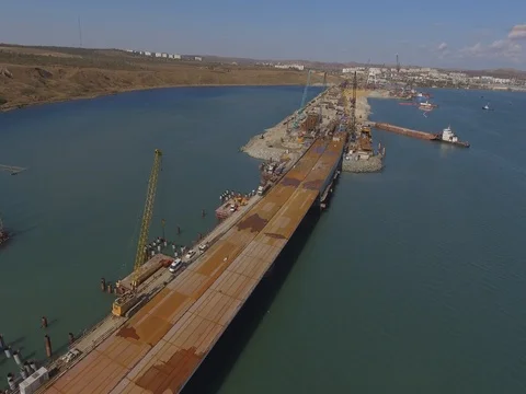 Crimean Bridge, Kerch side, flying along building site. 動画素材 81141712