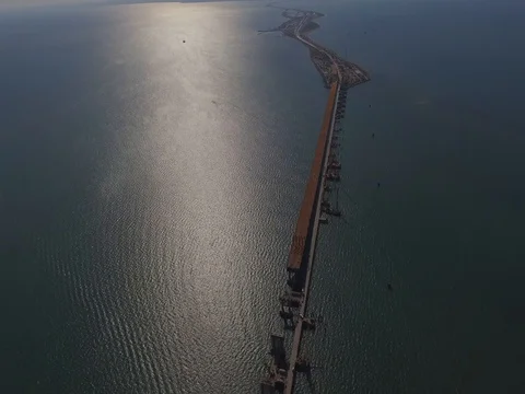 Crimean Bridge, panoramic view of strait from above, 1 arc installed Stock Footage 81141787