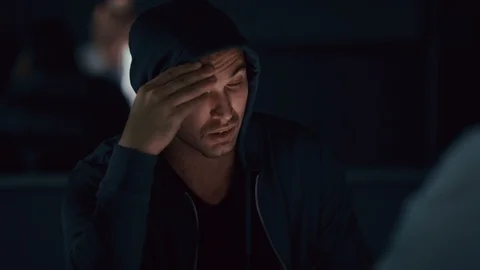 Criminal being interviewed in the interrogation room Stock Footage 106829034