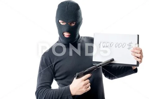 A criminal with a gun demands a ransom of $ 1000000 Stock Photos