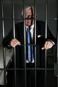 Criminal in Jail Cell Stock Photos