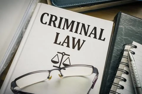 Criminal law book. Legislation and justice concept. Stock Photos