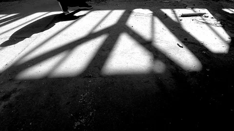 Criminal man pull out gun in dark spooky ruined building Stock Footage 120873096