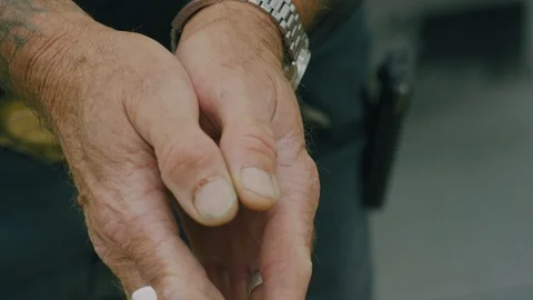 Criminal mans hands Stock Footage 97729428