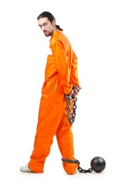 Criminal in orange robe in prison Stock Photos