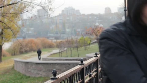 The criminal planning an attack and looking for a victim Stock Footage 82314393