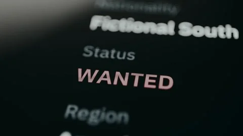 Criminal police database showing suspect status WANTED Stock Footage 331572201