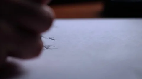 Criminal practicing forging someone elses signature on paper Video stock 76328817