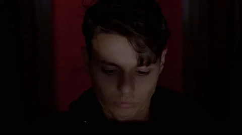 Criminal programmer in hood using VR glasses in dark room close up Stock Footage 68913826