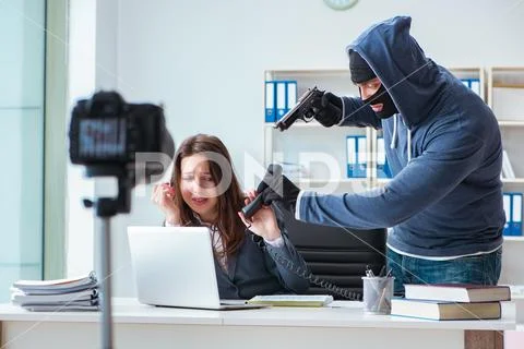 Criminal recording message for ransom with victim businesswoman Stock Photos
