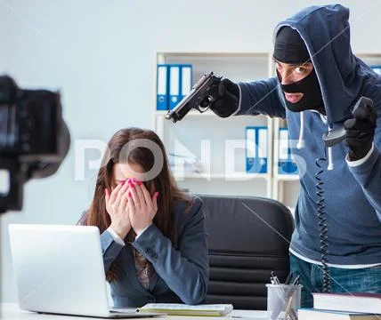 Criminal recording message for ransom with victim businesswoman Stock Photos