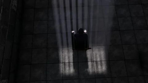 Criminal sitting in jail repenting and thinking Stock Footage 288171355