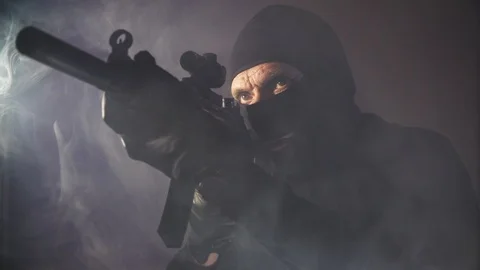 Criminal terrorist the thief the robber with weapons Stock Footage 93758064