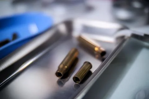 Criminalistic Laboratory, Bullet shell analysis, conceptual image Stock Photos