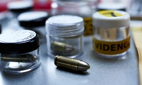 Criminalistic Laboratory, Bullet shell analysis, conceptual image 库存照片