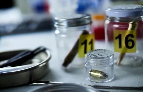 Criminalistic Laboratory, Bullet shell analysis, conceptual image 库存照片