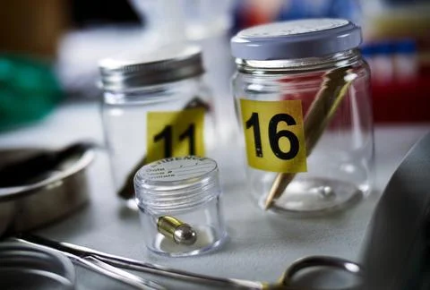 Criminalistic Laboratory, Bullet shell analysis, conceptual image 库存照片
