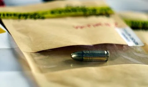 Criminalistic Laboratory, Bullet shell analysis, conceptual image 库存照片