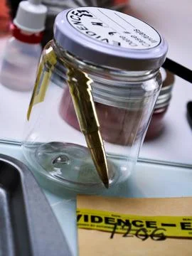 Criminalistic Laboratory, Bullet shell analysis, conceptual image 库存照片