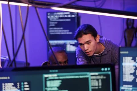 Criminals hacking into computer system 스톡 사진
