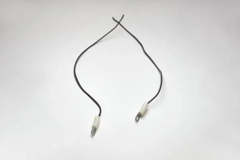 Crimp terminal loop connectors pair, shrink insulation. connected to long t.. Stock Photos