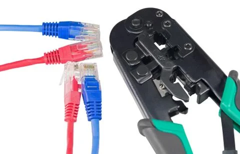 Crimping tool with a network cable isolated Stock Photos