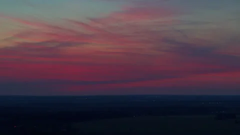 Crimson sunset with feathery clouds Stock Footage 174922156