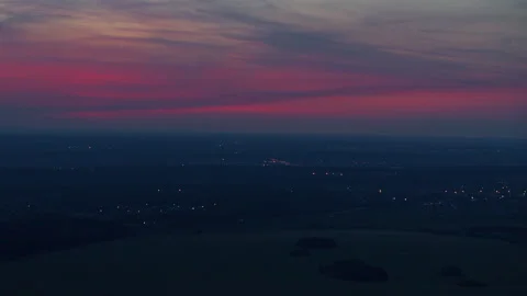Crimson sunset with feathery clouds Stock Footage 179928774