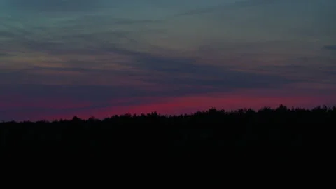 Crimson sunset with feathery clouds Stock Footage 194117741