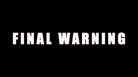 Crimson text 'FINAL WARNING' flashing across dark background with cinematic.. Stock Footage 344035444