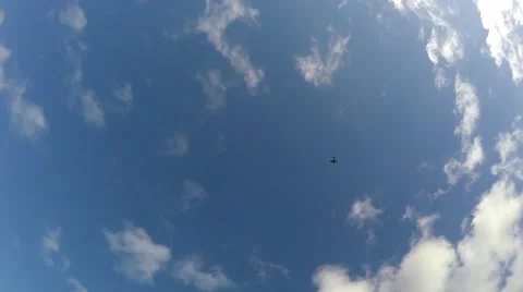 Crisp blue sky clouds airplane moving from top screen to down 4k Stock Footage 59961509