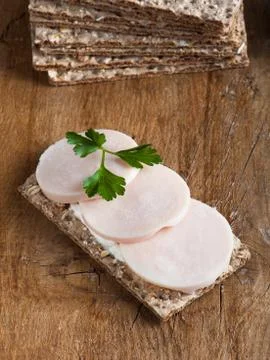 Crisp bread with ham and cream cheese Stock Photos