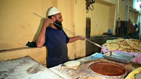 Crisp Bread Pulled from Flame Lit Chamber Stock Footage 312724619