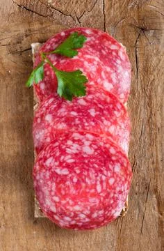 Crisp bread with salami Foto stock
