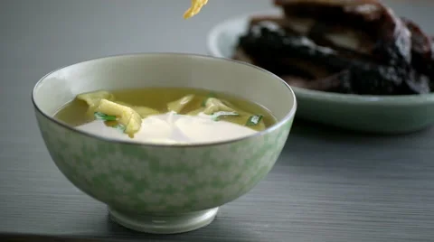 Crisp falling in wonton soup 스톡 동영상 46668417