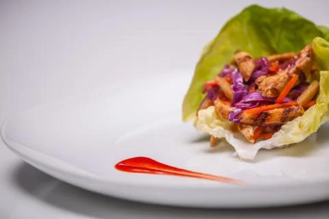 Crisp fresh Roasted Vegetables wrapped in lettuce Stock Photos