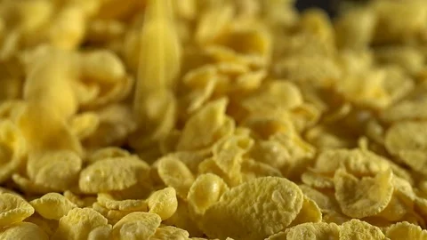 Crisp tasty cornflakes falling down. Video stock 74807516