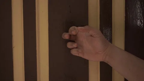 Crisp video of a hand knocking on a door, complete with authentic knocking sound Stock Footage 314021521