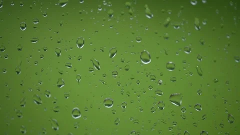 Crisp Water: Refreshing Pour in Green Glass Video stock 343658023